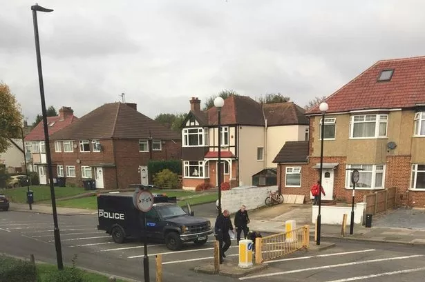 Petrol and combustible material inside property in Northolt, as police stand-off enters third day